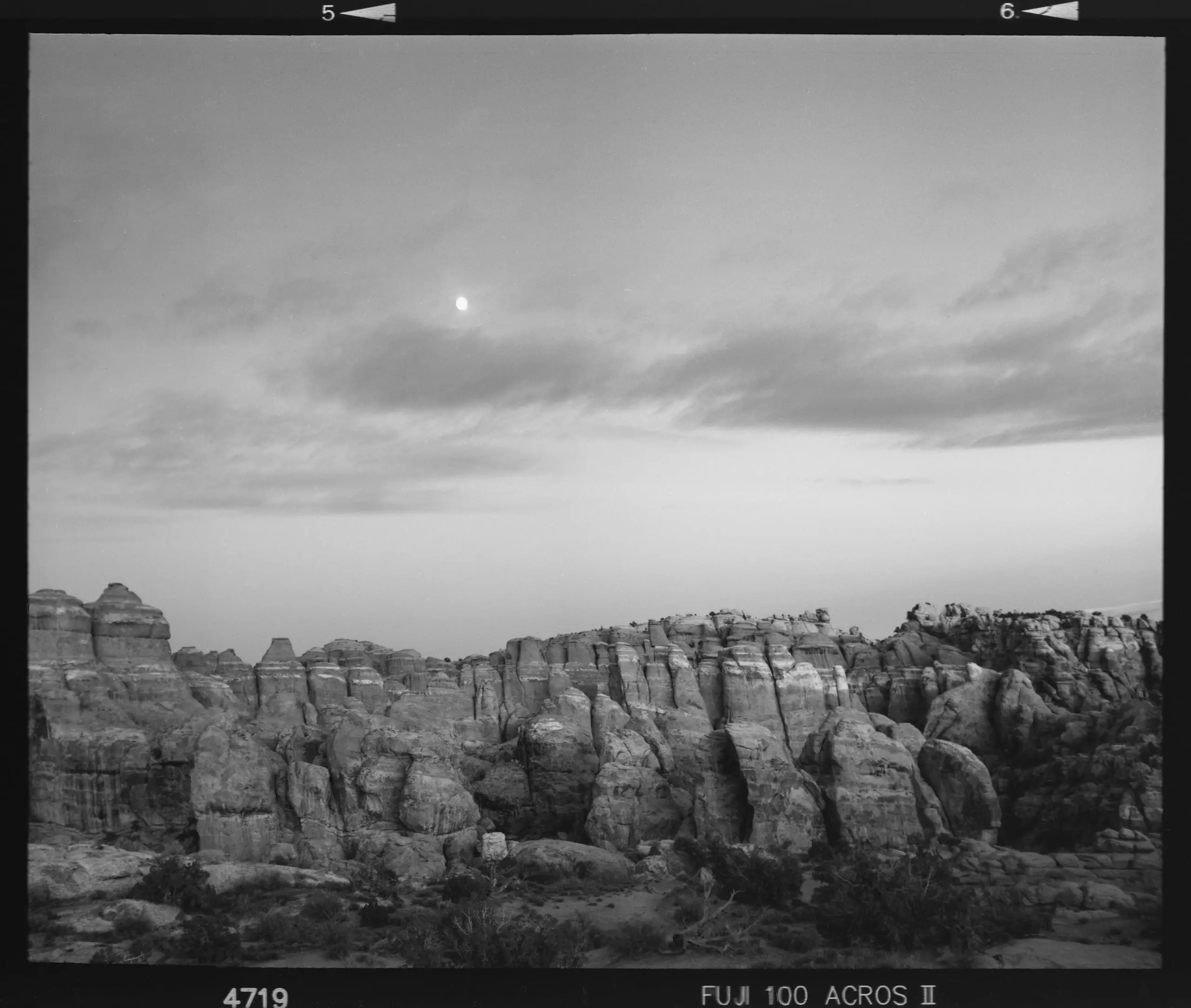 Arch and sky on black and white film