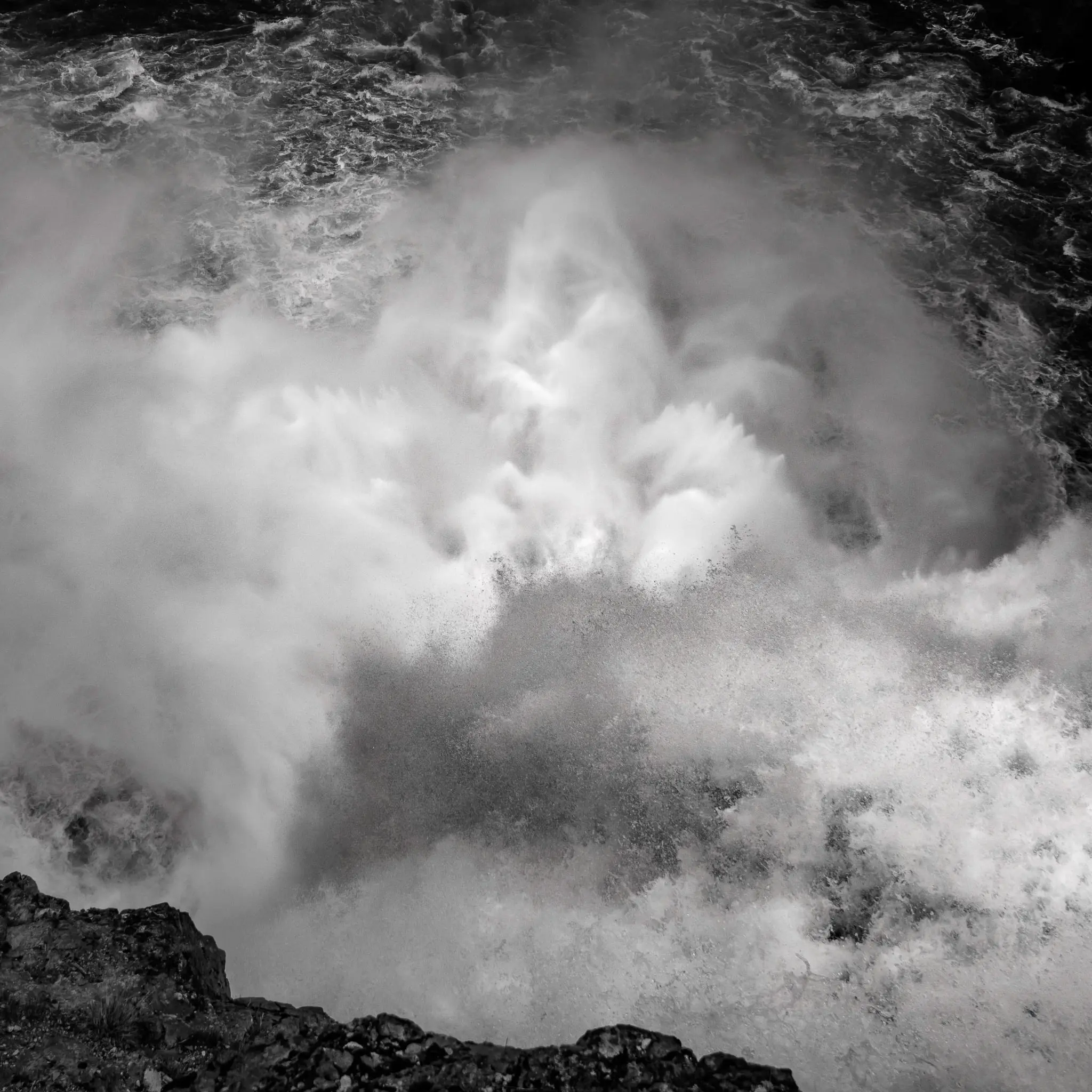 Black and white landscape with layered ridges